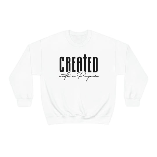 A white crewneck sweatshirt with black text, ideal for any situation. Made from 50% cotton and 50% polyester, featuring a ribbed knit collar and a loose fit. Created With A Purpose Crewneck.