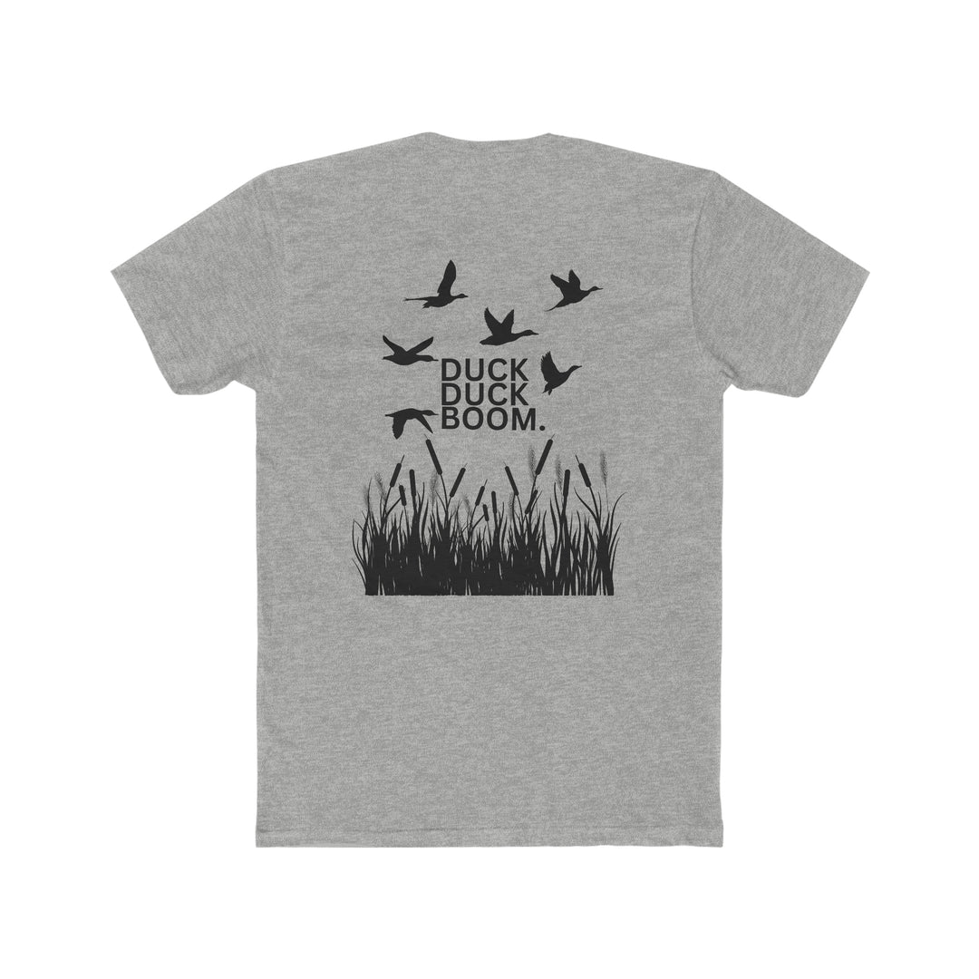 Duck Duck Boom Tee: Men's premium fitted short sleeve shirt with birds flying over grass design. Comfy, light, ribbed knit collar, roomy fit, 100% cotton. Sizes XS-4XL.