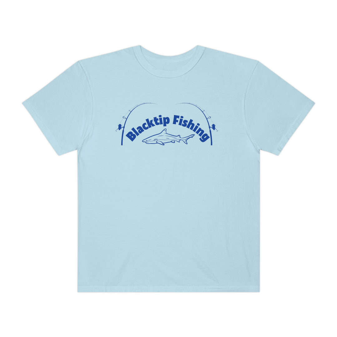 A customizable Blacktip Fishing Unisex Tee by Comfort Colors, featuring a shark logo on light blue fabric. 100% ring-spun cotton, relaxed fit, durable double-needle stitching, and seamless design for comfort.