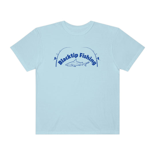 A customizable Blacktip Fishing Unisex Tee by Comfort Colors, featuring a shark logo on light blue fabric. 100% ring-spun cotton, relaxed fit, durable double-needle stitching, and seamless design for comfort.