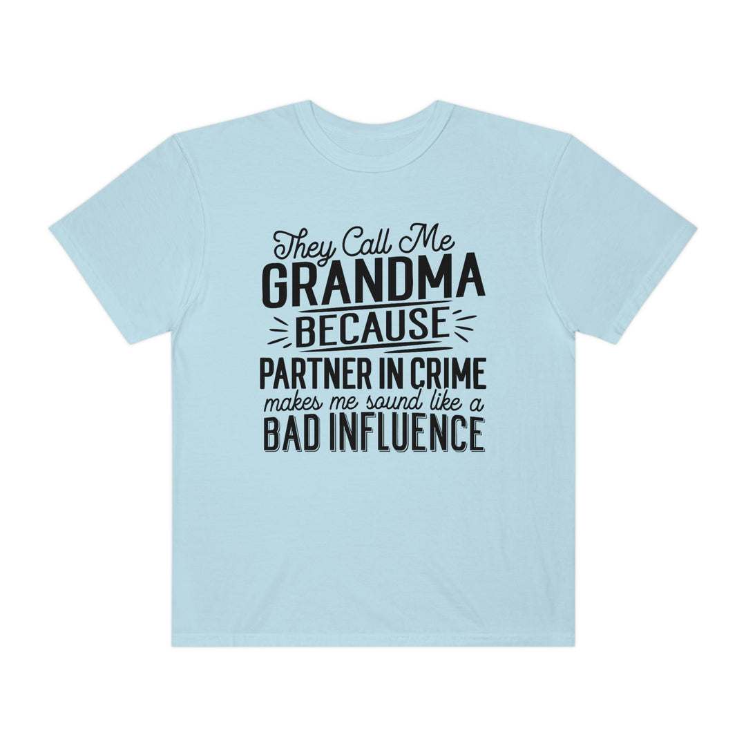 Relaxed fit They Call Me Grandma Tee, light blue with black text. 100% ring-spun cotton, garment-dyed for coziness. Durable double-needle stitching, seamless sides for tubular shape.