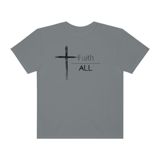 A grey t-shirt featuring a cross and text design, embodying the Faith Over All Tee ethos. Made of 100% ring-spun cotton, with a relaxed fit and durable double-needle stitching for everyday comfort and style.