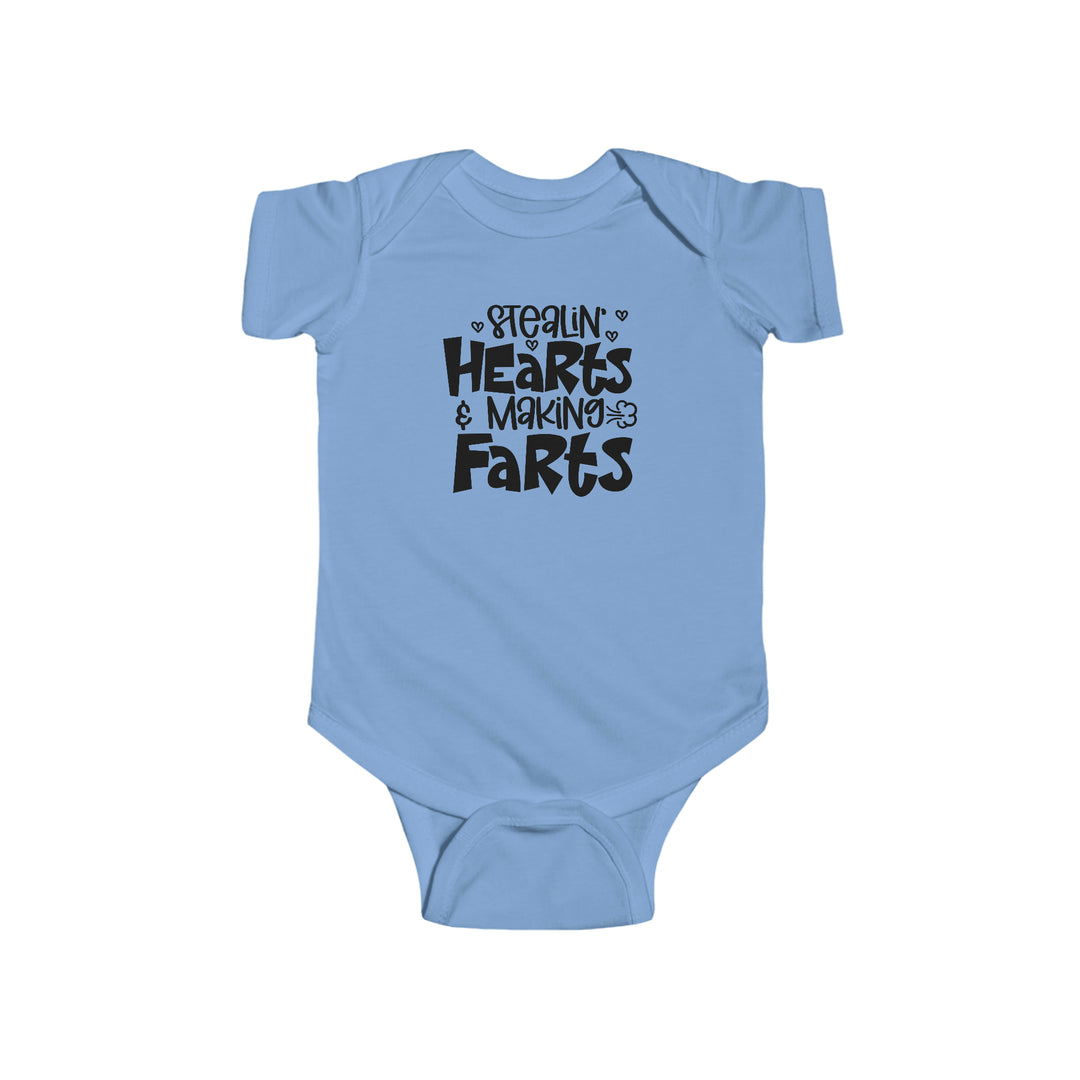 A baby bodysuit featuring the title Stealin Hearts and Making Farts Onesie from Worlds Worst Tees. Made of 100% cotton, with ribbed bindings and plastic snaps for easy changing access. Combed ringspun cotton, light fabric, tear away label.