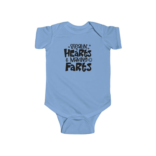 A baby bodysuit featuring the title Stealin Hearts and Making Farts Onesie from Worlds Worst Tees. Made of 100% cotton, with ribbed bindings and plastic snaps for easy changing access. Combed ringspun cotton, light fabric, tear away label.
