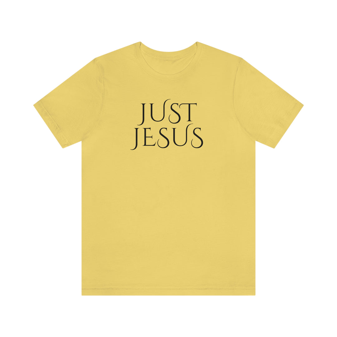 A beloved Just Jesus Tee in yellow with black text. Unisex jersey tee with ribbed knit collar, taping on shoulders, and dual side seams for lasting shape. 100% Airlume combed cotton, retail fit.