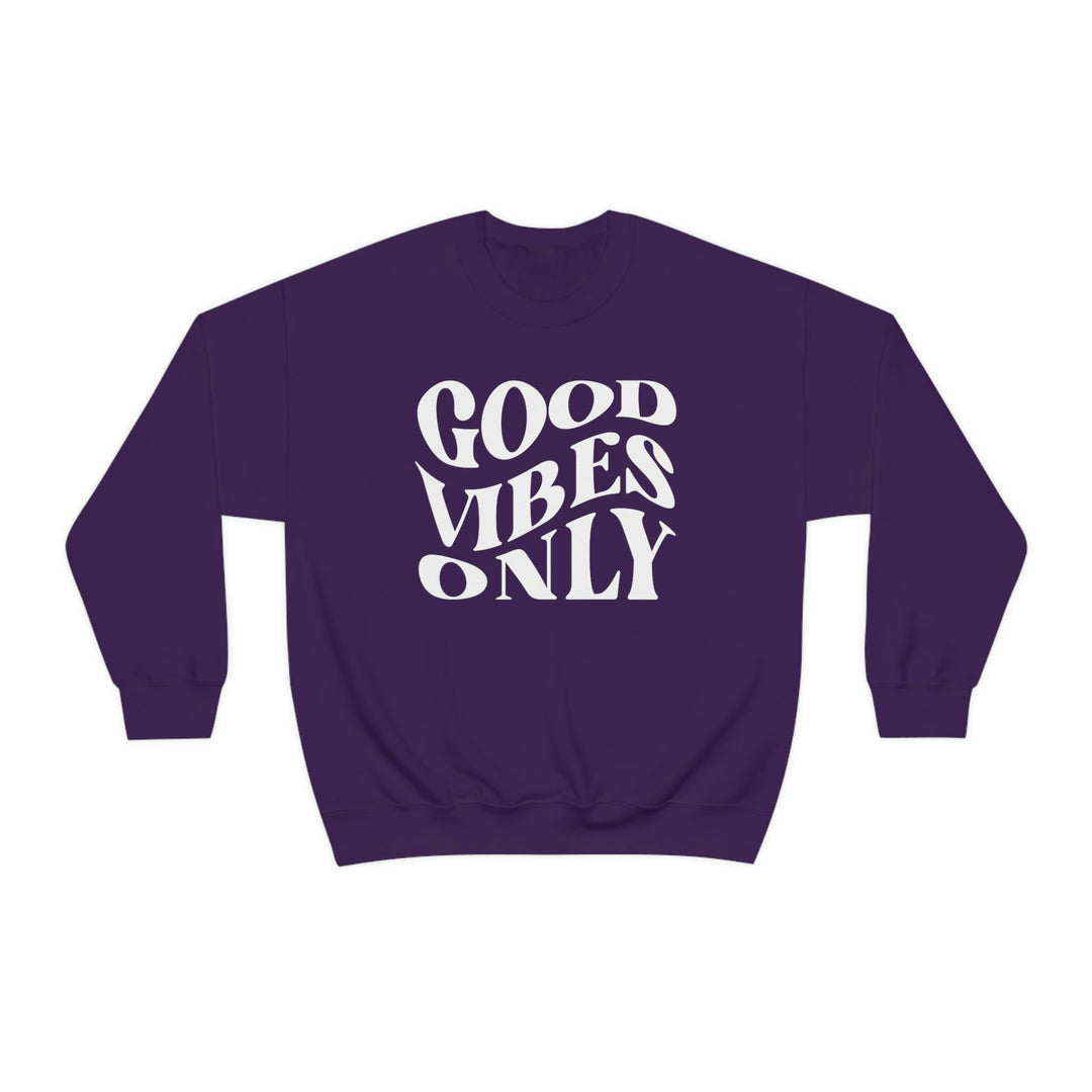 A cozy unisex heavy blend crewneck sweatshirt featuring the Good Vibes Only design. Ribbed knit collar, seamless sides, and a loose fit for ultimate comfort. Perfect for casual days.