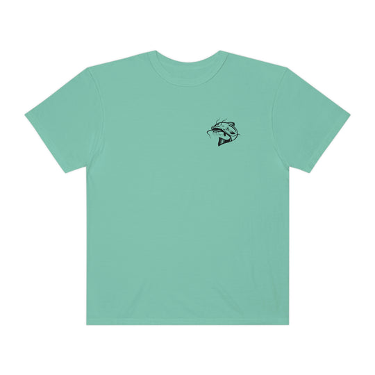Comfort Colors Flathead Fishing Unisex Tee: 100% ring-spun cotton, relaxed fit, durable double-needle stitching, tubular shape. Green tee with fish logo.