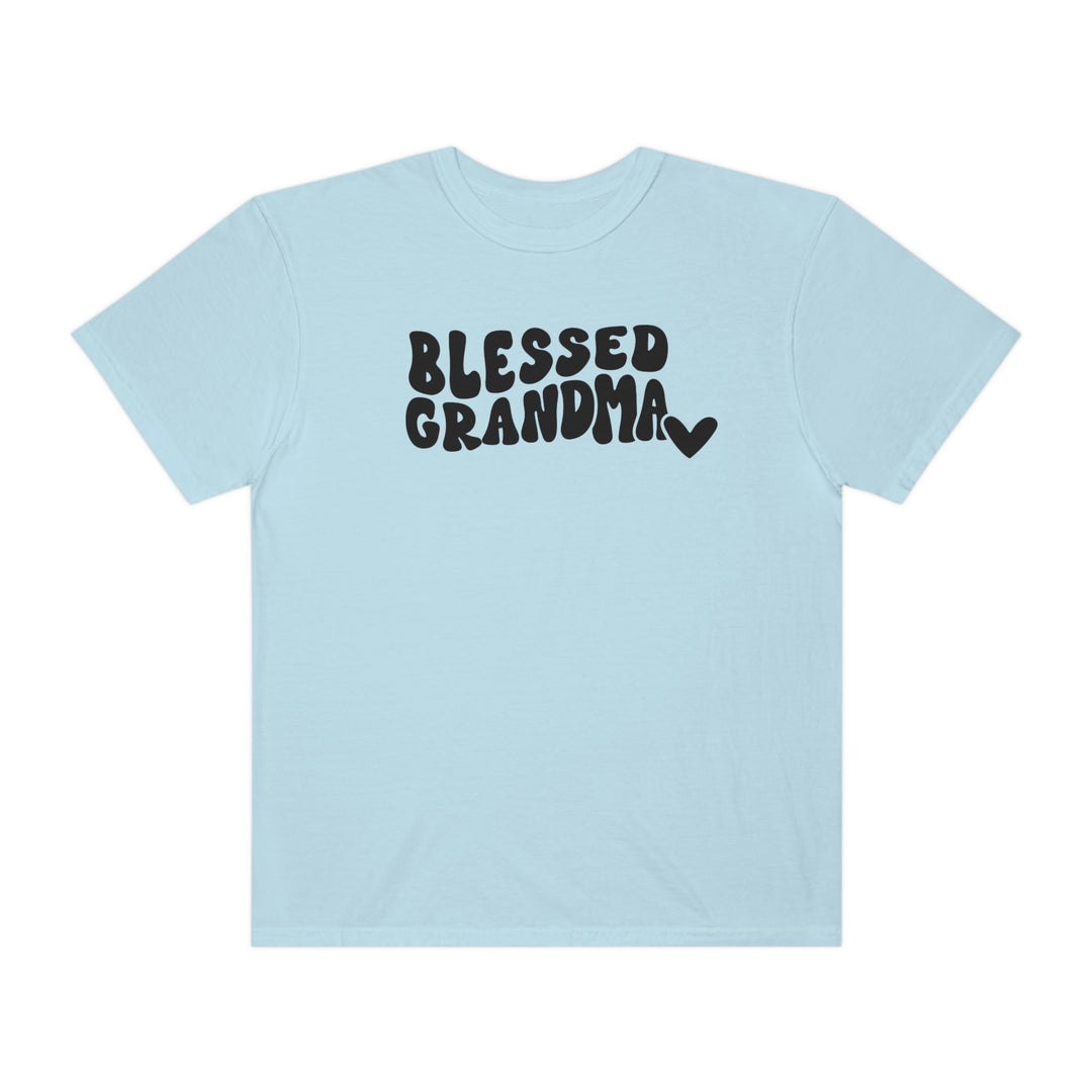 Alt text: Blessed Grandma Tee: Light blue t-shirt with black text, 100% ring-spun cotton, medium weight, relaxed fit, double-needle stitching for durability, no side-seams for tubular shape.