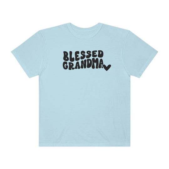 Alt text: Blessed Grandma Tee: Light blue t-shirt with black text, 100% ring-spun cotton, medium weight, relaxed fit, double-needle stitching for durability, no side-seams for tubular shape.