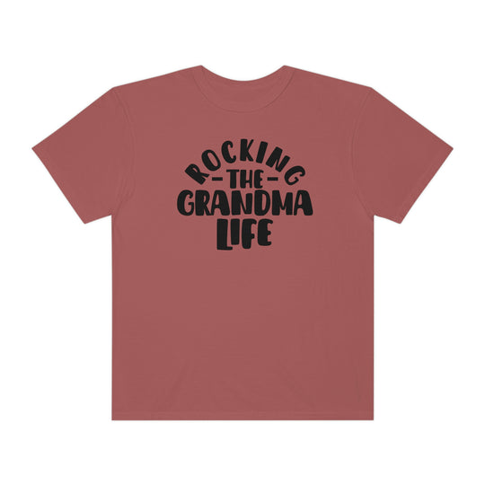 Rocking the Grandma Life Tee: 100% ring-spun cotton t-shirt with a relaxed fit. Garment-dyed for extra coziness, double-needle stitching for durability, and seamless design for a tubular shape. Sizes S to 3XL.