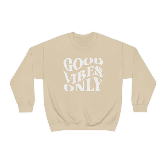 A cozy unisex Good Vibes Only crewneck sweatshirt in beige with white text. Polyester-cotton blend, ribbed knit collar, no itchy side seams. Medium-heavy fabric, loose fit, sewn-in label.