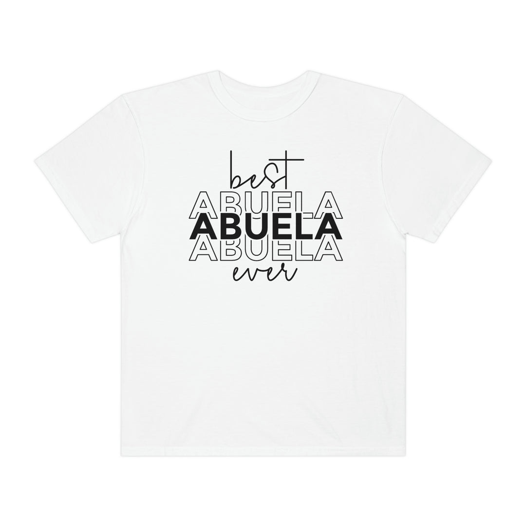 A ring-spun cotton tee, garment-dyed for coziness and durability. Featuring the title Best Abuela Ever Tee in black text on a white shirt. Relaxed fit, double-needle stitching, and seamless design for comfort.