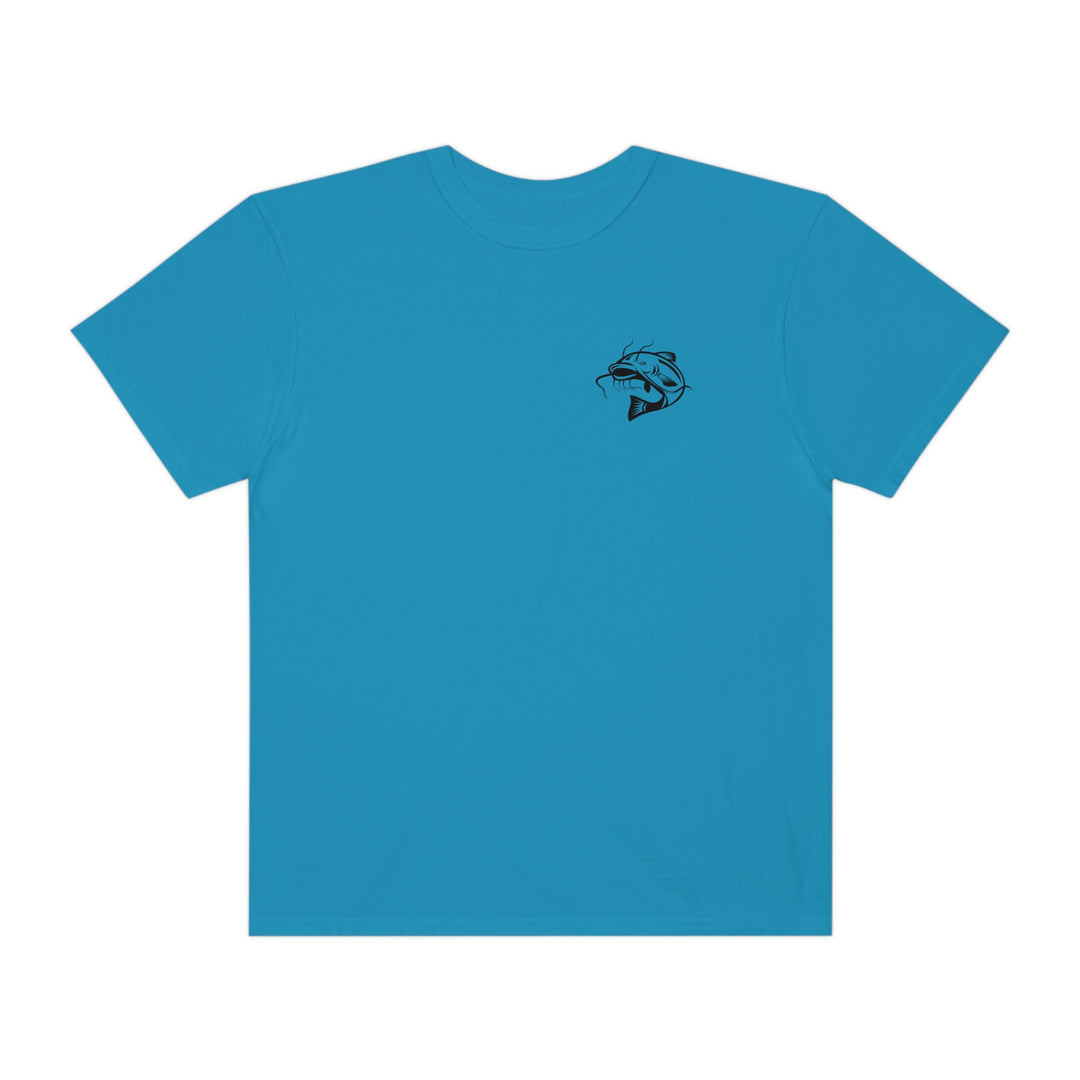 Comfort Colors Flathead Fishing Unisex Tee: A blue t-shirt with a fish logo, 100% ring-spun cotton, relaxed fit, and durable double-needle stitching. From Worlds Worst Tees.