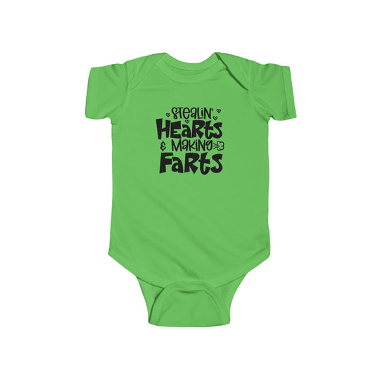 A humorous infant bodysuit titled Stealin Hearts and Making Farts Onesie from Worlds Worst Tees. Features include 100% cotton fabric, ribbed knitting for durability, and plastic snaps for easy changing access.