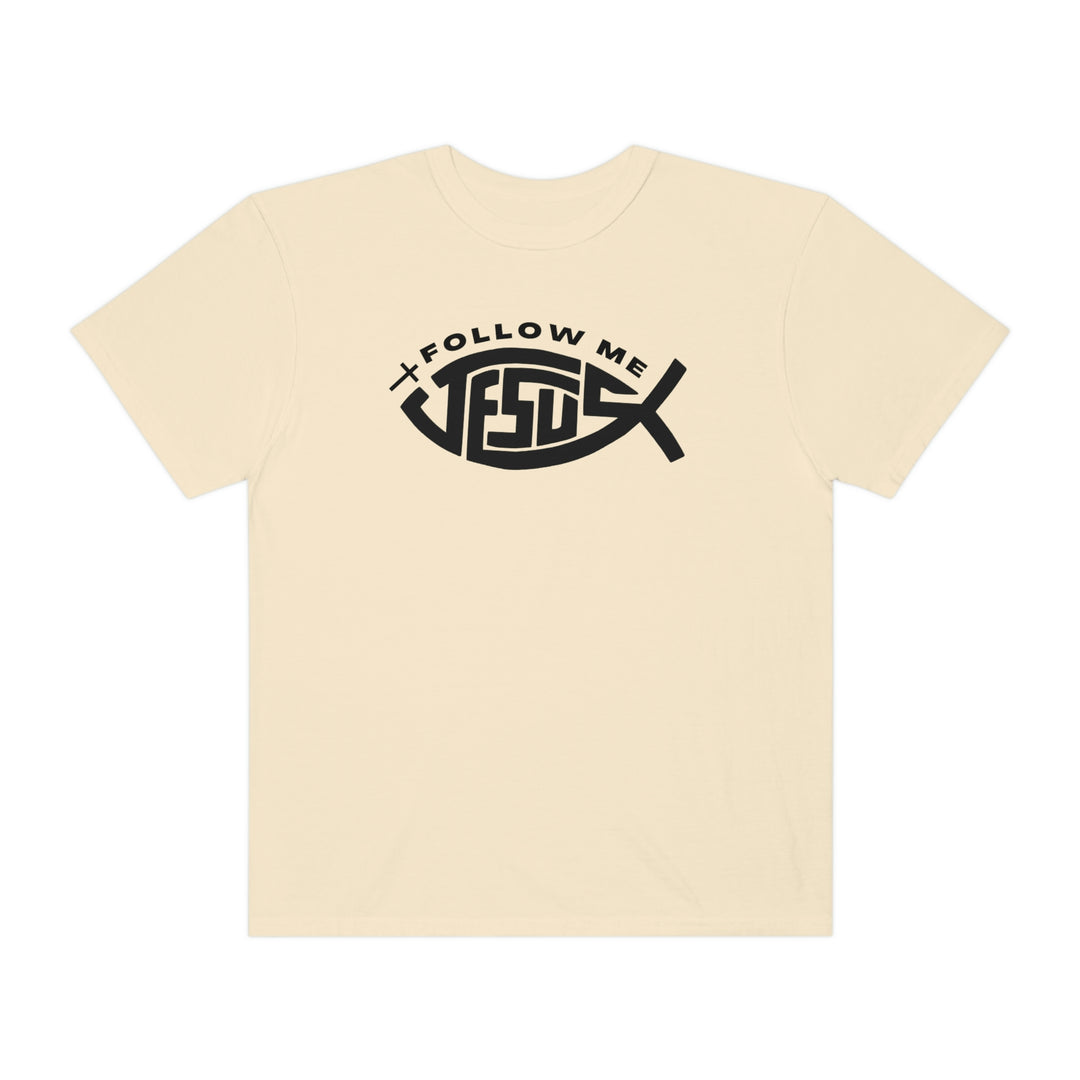 Relaxed fit Jesus Follow Me Tee, white shirt with black text. 100% ring-spun cotton, garment-dyed for coziness. Durable double-needle stitching, no side-seams for tubular shape.