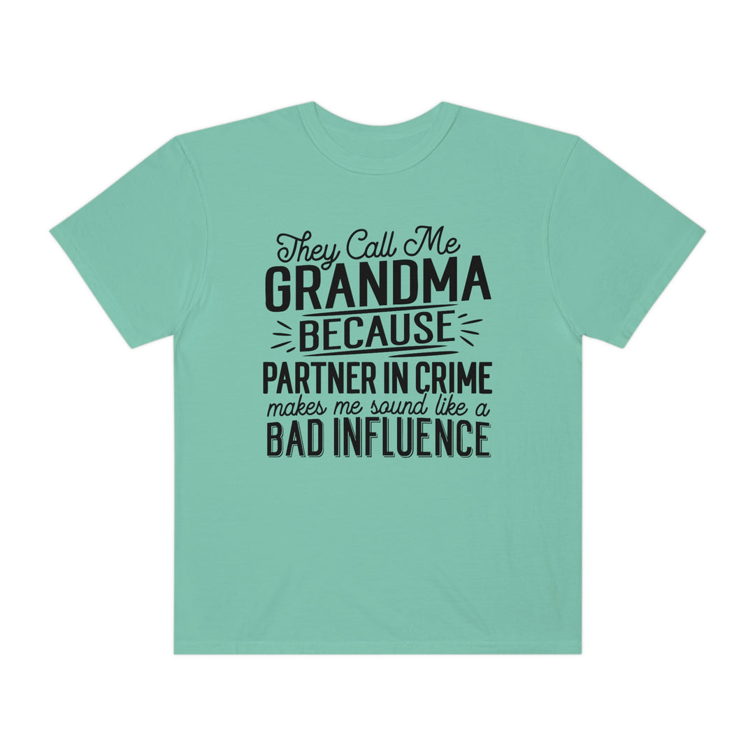 A relaxed fit They Call Me Grandma Tee, back view, 100% ring-spun cotton, garment-dyed for coziness. Double-needle stitching, no side-seams for durability and shape retention. Sizes S to 3XL.