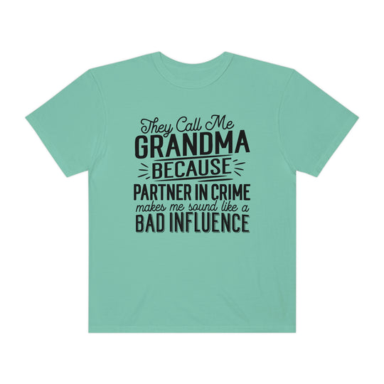 A relaxed fit They Call Me Grandma Tee, back view, 100% ring-spun cotton, garment-dyed for coziness. Double-needle stitching, no side-seams for durability and shape retention. Sizes S to 3XL.