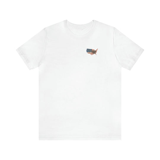 A white t-shirt featuring a flag patch, embodying patriotism with a USA Some Gave All Tee. Unisex jersey tee with ribbed knit collars, taping on shoulders, and Airlume combed cotton.