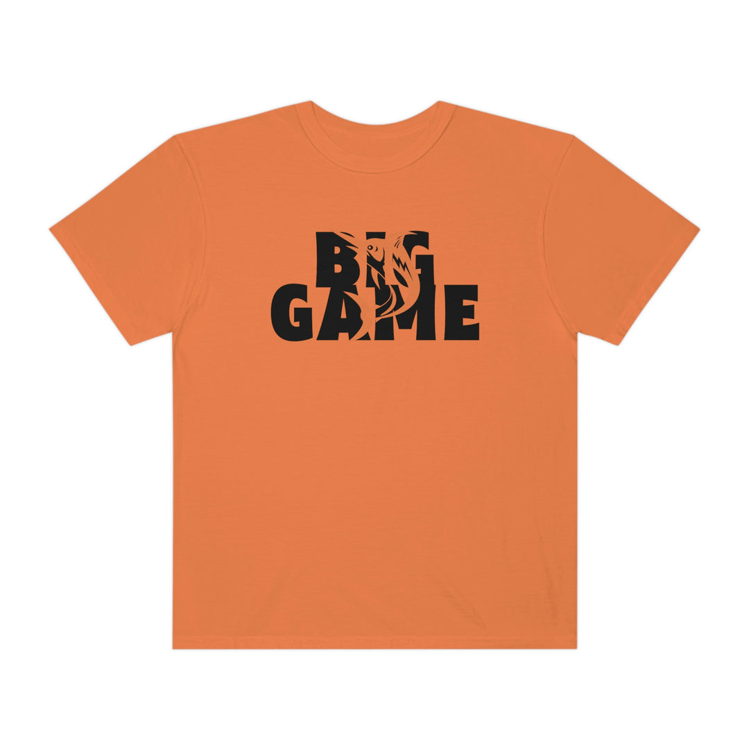 Comfort Colors BIG GAME FISHER Tee: Orange tee with black logo, 100% ring-spun cotton, relaxed fit, durable double-needle stitching, no side-seams. Ideal for daily wear. From Worlds Worst Tees.