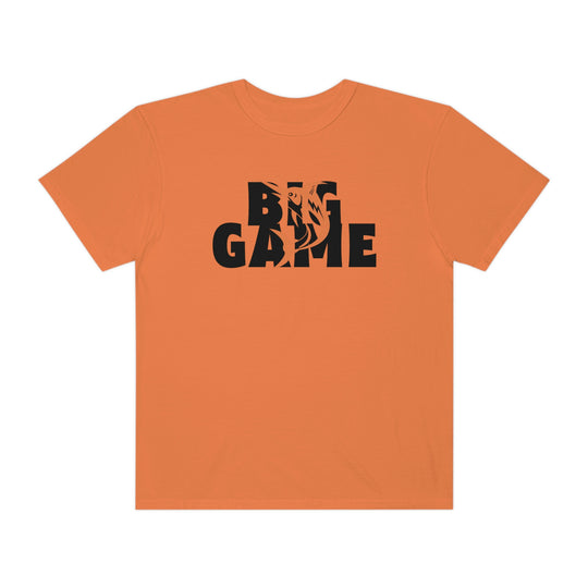 Comfort Colors BIG GAME FISHER Tee: Orange tee with black logo, 100% ring-spun cotton, relaxed fit, durable double-needle stitching, no side-seams. Ideal for daily wear. From Worlds Worst Tees.