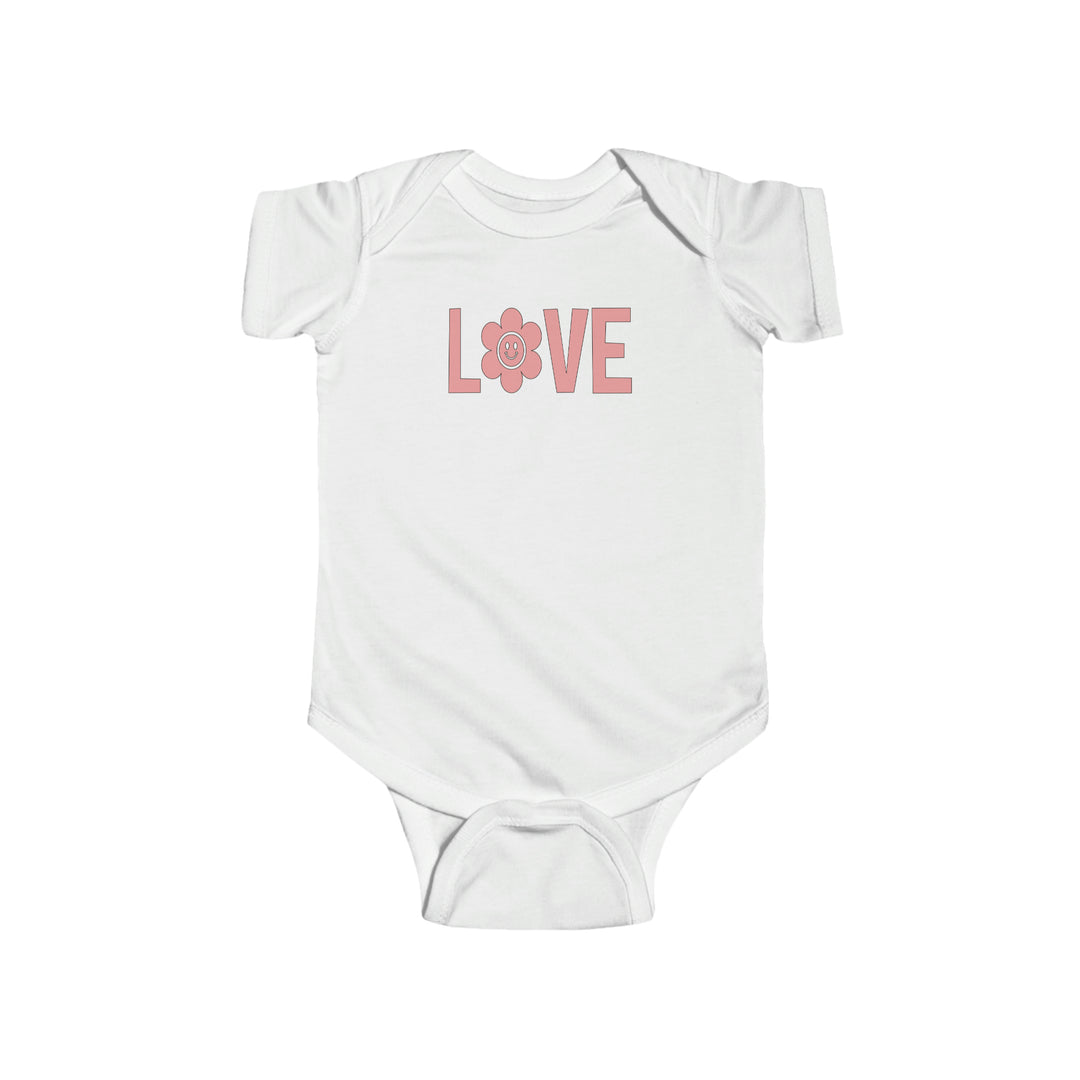 A white baby bodysuit with pink text, featuring a love onesie design. Made of 100% combed ringspun cotton, light fabric, with ribbed knit bindings and plastic snaps for easy changing access. From Worlds Worst Tees.