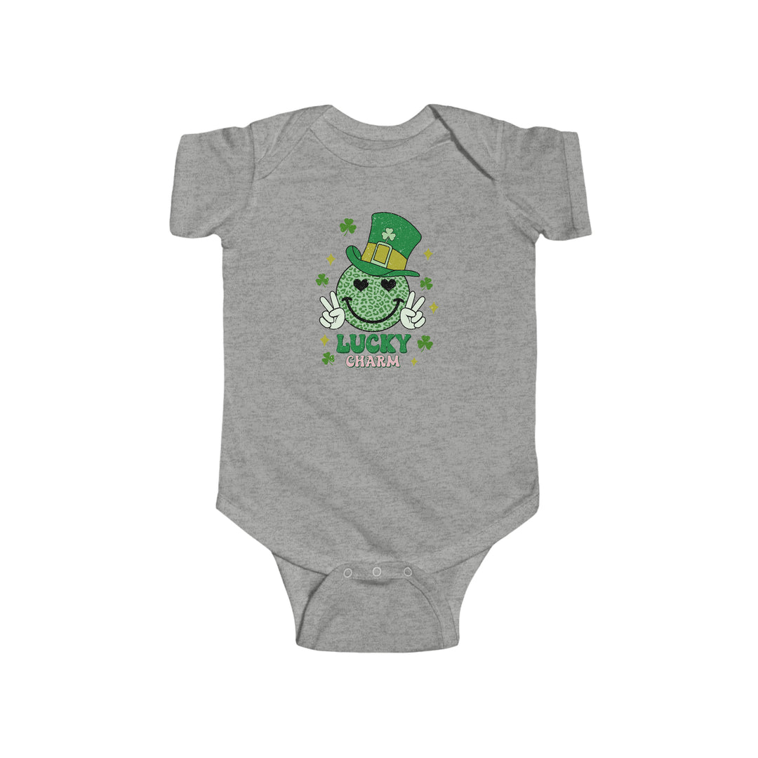 Little Charm Onesie: Grey baby bodysuit with green hat featuring a cute cartoon character. Soft 100% cotton fabric, ribbed knit bindings, and plastic snaps for easy changes. Perfect for NB to 24M sizes.