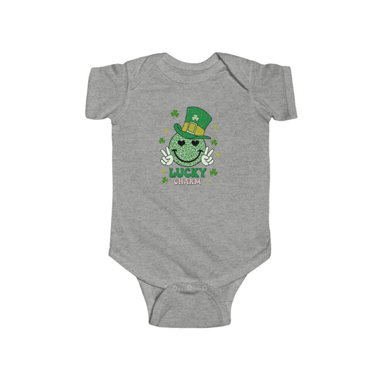 Little Charm Onesie: Grey baby bodysuit with green hat featuring a cute cartoon character. Soft 100% cotton fabric, ribbed knit bindings, and plastic snaps for easy changes. Perfect for NB to 24M sizes.