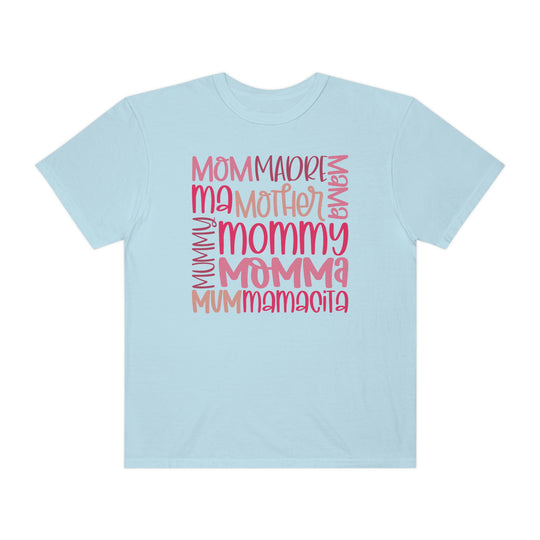 A Mama Tee in light blue with pink text, made of 100% ring-spun cotton. Garment-dyed for extra coziness, featuring a relaxed fit, double-needle stitching, and no side-seams for durability and shape retention.