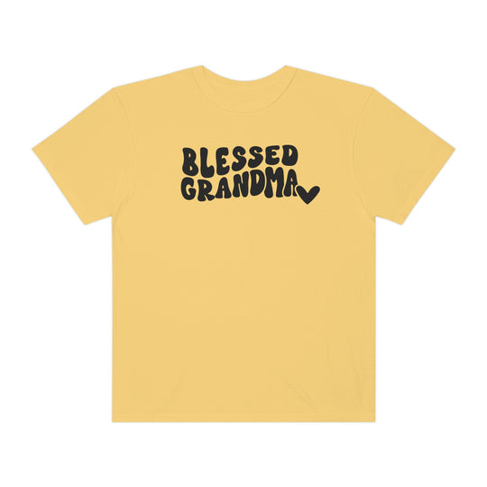 Blessed Grandma Tee: Yellow shirt with black text. 100% ring-spun cotton, garment-dyed for coziness. Relaxed fit, double-needle stitching for durability. No side-seams for shape retention.