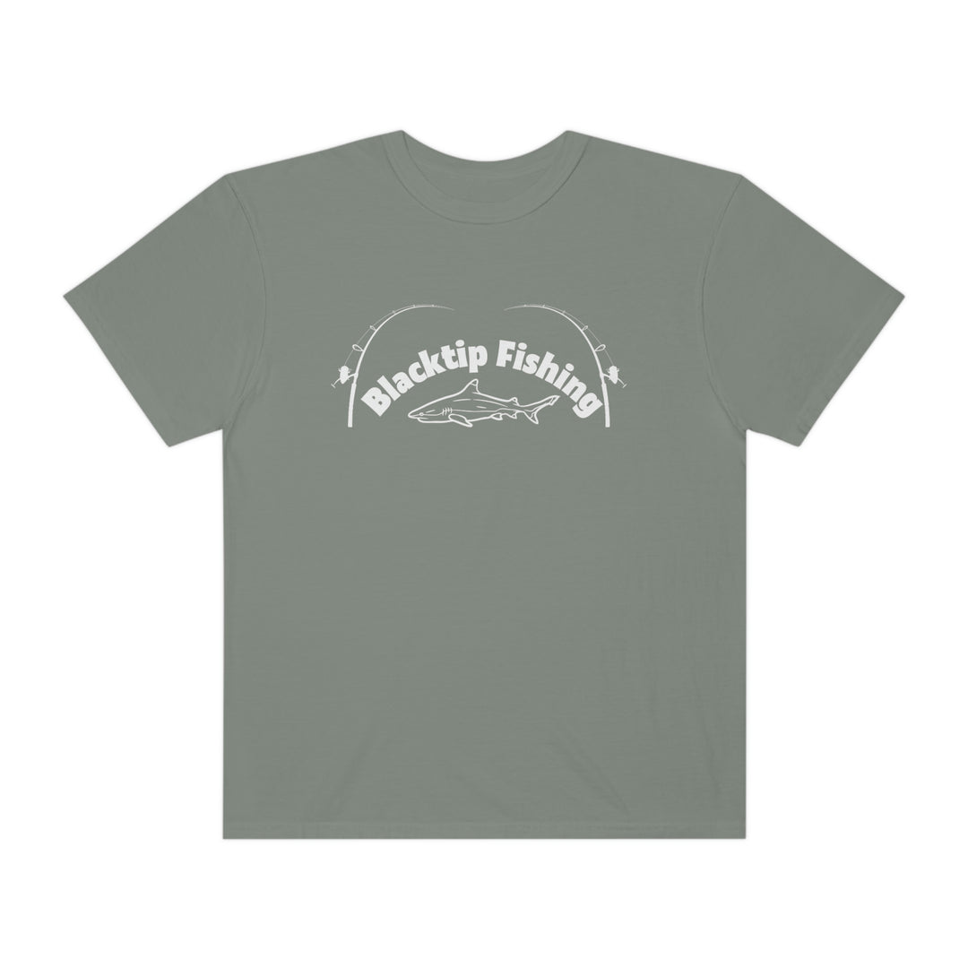 A customizable Blacktip Fishing Unisex Tee by Comfort Colors, featuring a shark design and fishing poles on a grey shirt. Made of 100% ring-spun cotton with a relaxed fit and durable double-needle stitching.