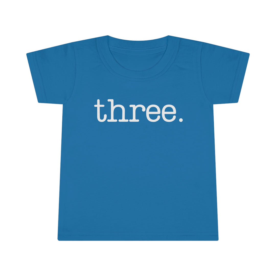 Three Toddler Tee with classic fit and high stitch density. Features 3/4 double-needle topstitched collar, double-needle sleeve, and bottom hems for durability. Made of 100% Ringspun cotton. Light fabric, Classic Fit.