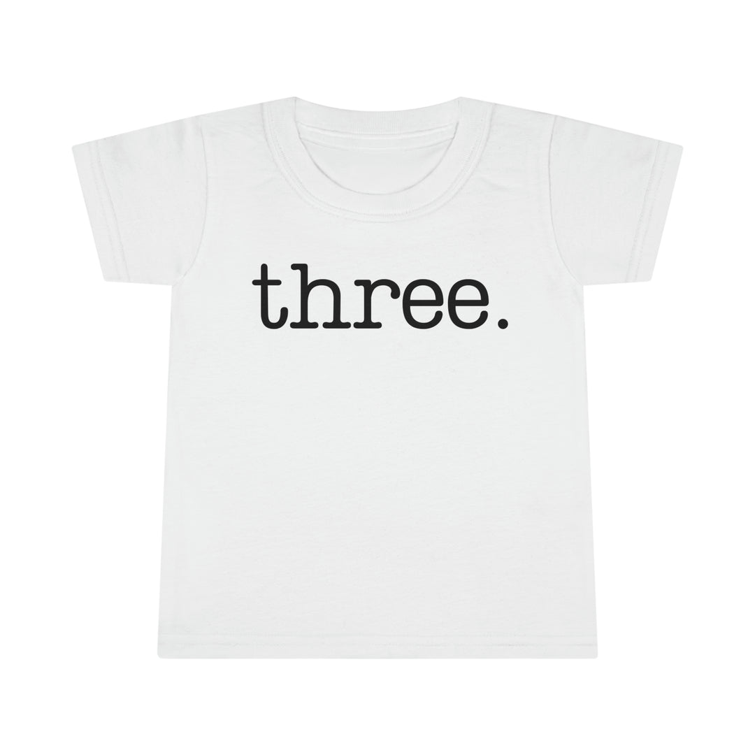 A durable Three Toddler Tee with a classic fit, featuring high stitch density and double-needle topstitched collar and hems. Made of 100% Ringspun cotton, light fabric, perfect for kids.
