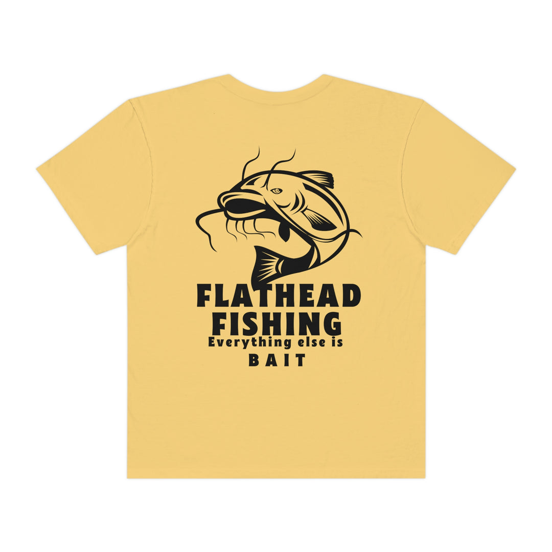 Comfort Colors Flathead Fishing Unisex Tee: A yellow shirt featuring a fish design and logo. 100% ring-spun cotton, relaxed fit, durable double-needle stitching, and seamless sides for comfort.