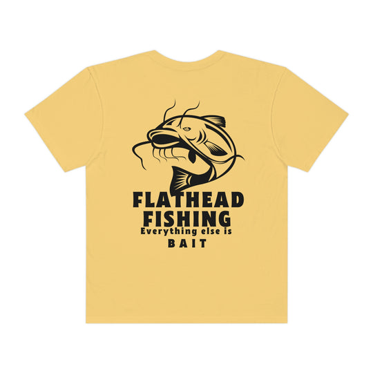 Comfort Colors Flathead Fishing Unisex Tee: A yellow shirt featuring a fish design and logo. 100% ring-spun cotton, relaxed fit, durable double-needle stitching, and seamless sides for comfort.