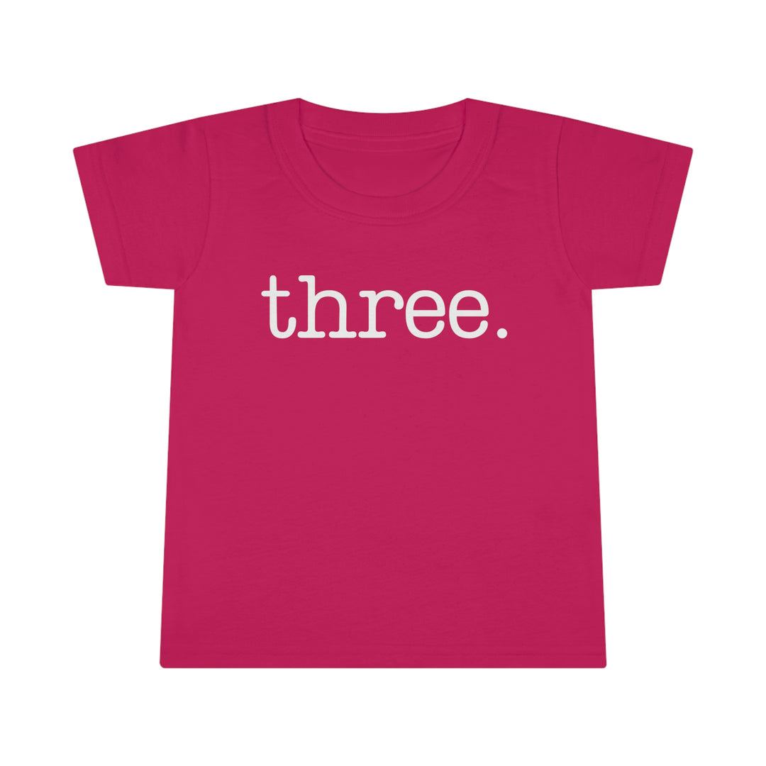 A durable Three Toddler Tee with a classic fit, high stitch density, and double-needle topstitched collar. Made of 100% Ringspun cotton, light fabric, perfect for kids.