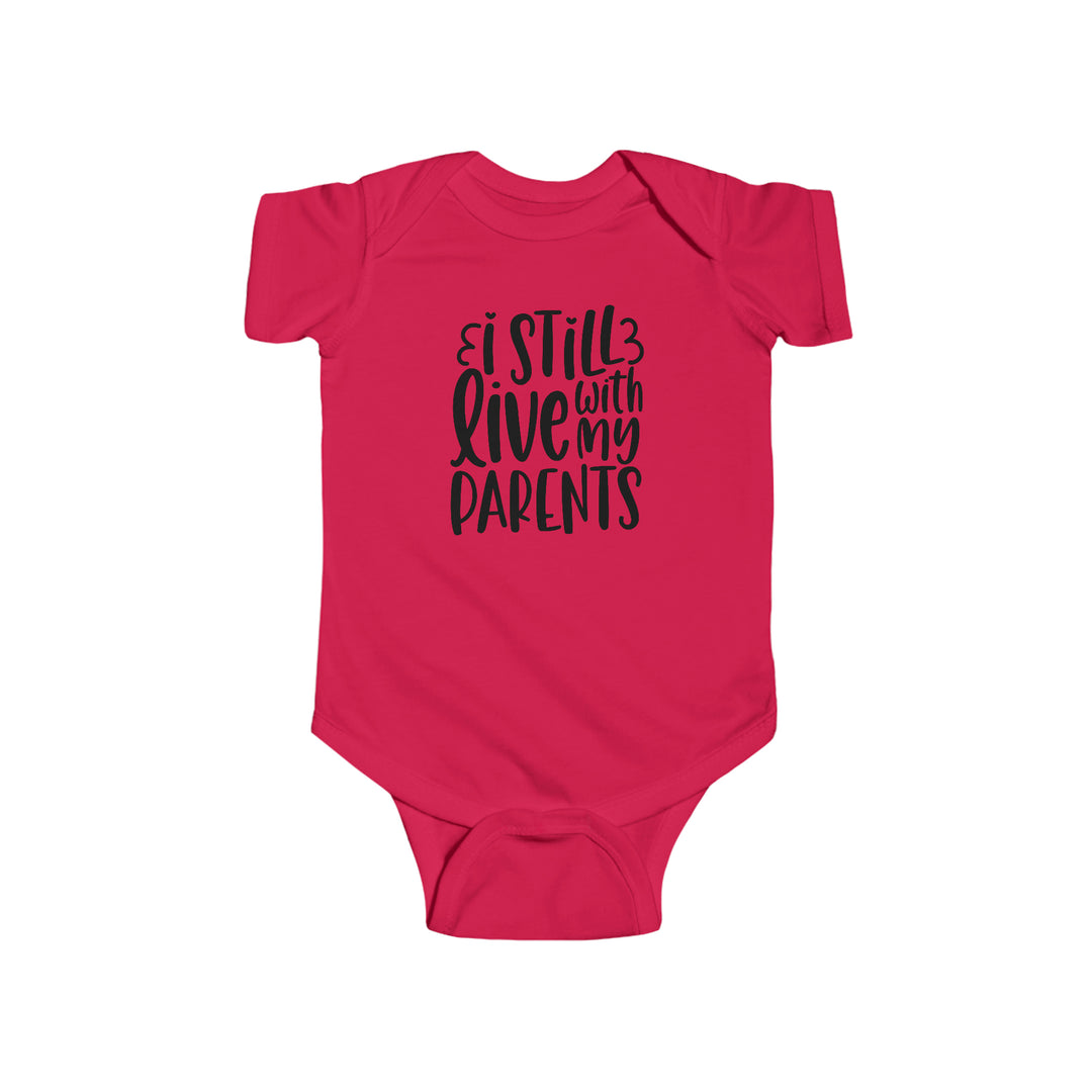 A pink baby bodysuit with black text, featuring the playful phrase I Still Live With My Parents Onesie. Made of 100% cotton, light fabric with ribbed bindings and plastic snaps for easy changing access. Dimensions: NB (0-3M) - 7.32W x 11.46L, 6M - 8.66W x 12.48L, 12M - 10.00W x 13.50L, 18M - 11.02W x 14.49L, 24M - 12.01W x 15.51L.