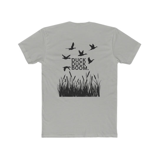A premium fitted men’s Duck Duck Boom Tee, featuring ribbed knit collar, roomy fit, and 100% combed cotton fabric. Classic, comfy, and light for workouts or daily wear.