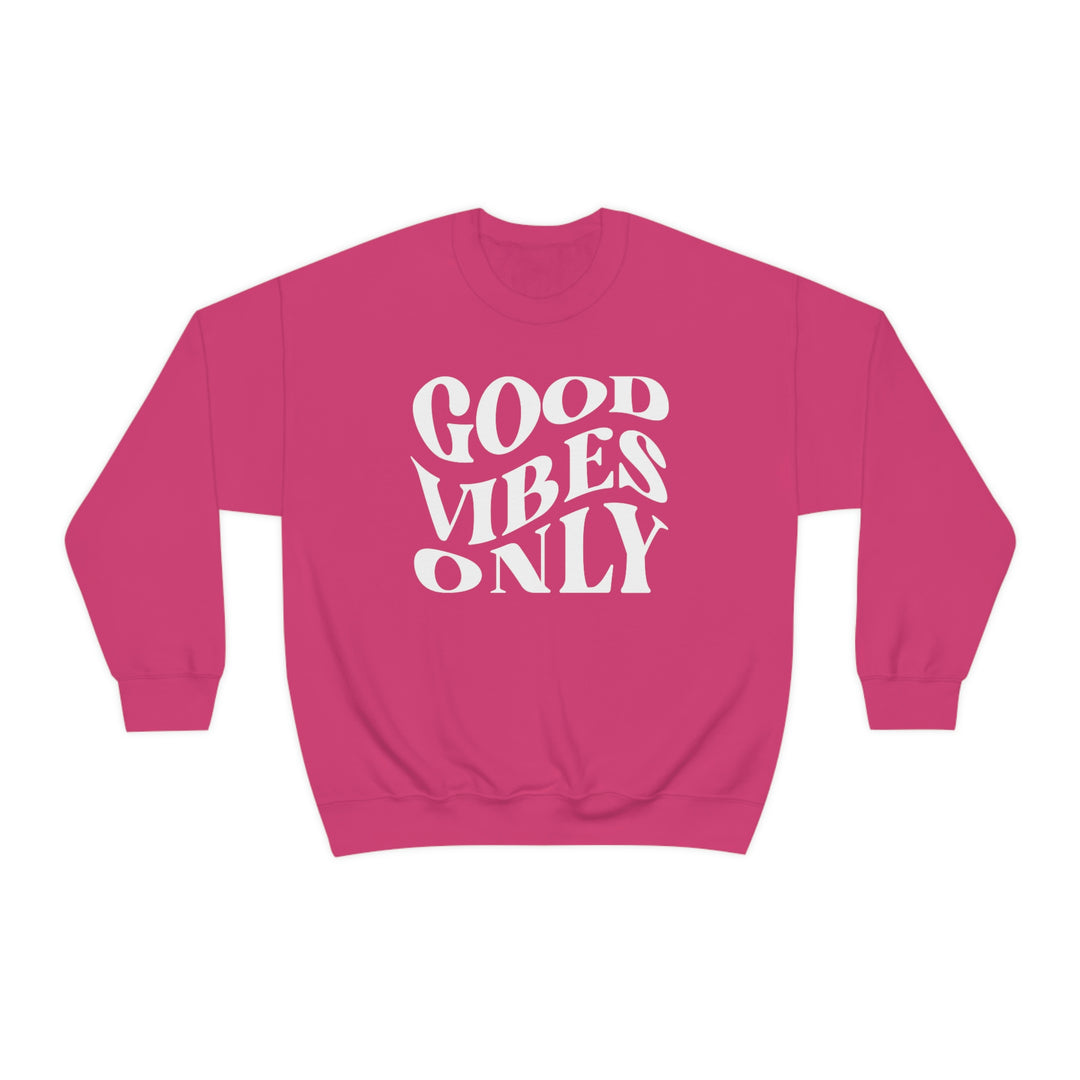 A cozy unisex heavy blend crewneck sweatshirt featuring Good Vibes Only design. Made of 50% cotton, 50% polyester with ribbed knit collar. Medium-heavy fabric, loose fit, and sewn-in label. Ideal for comfort in various settings.