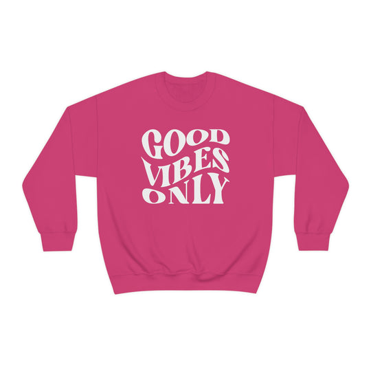A cozy unisex heavy blend crewneck sweatshirt featuring Good Vibes Only design. Made of 50% cotton, 50% polyester with ribbed knit collar. Medium-heavy fabric, loose fit, and sewn-in label. Ideal for comfort in various settings.