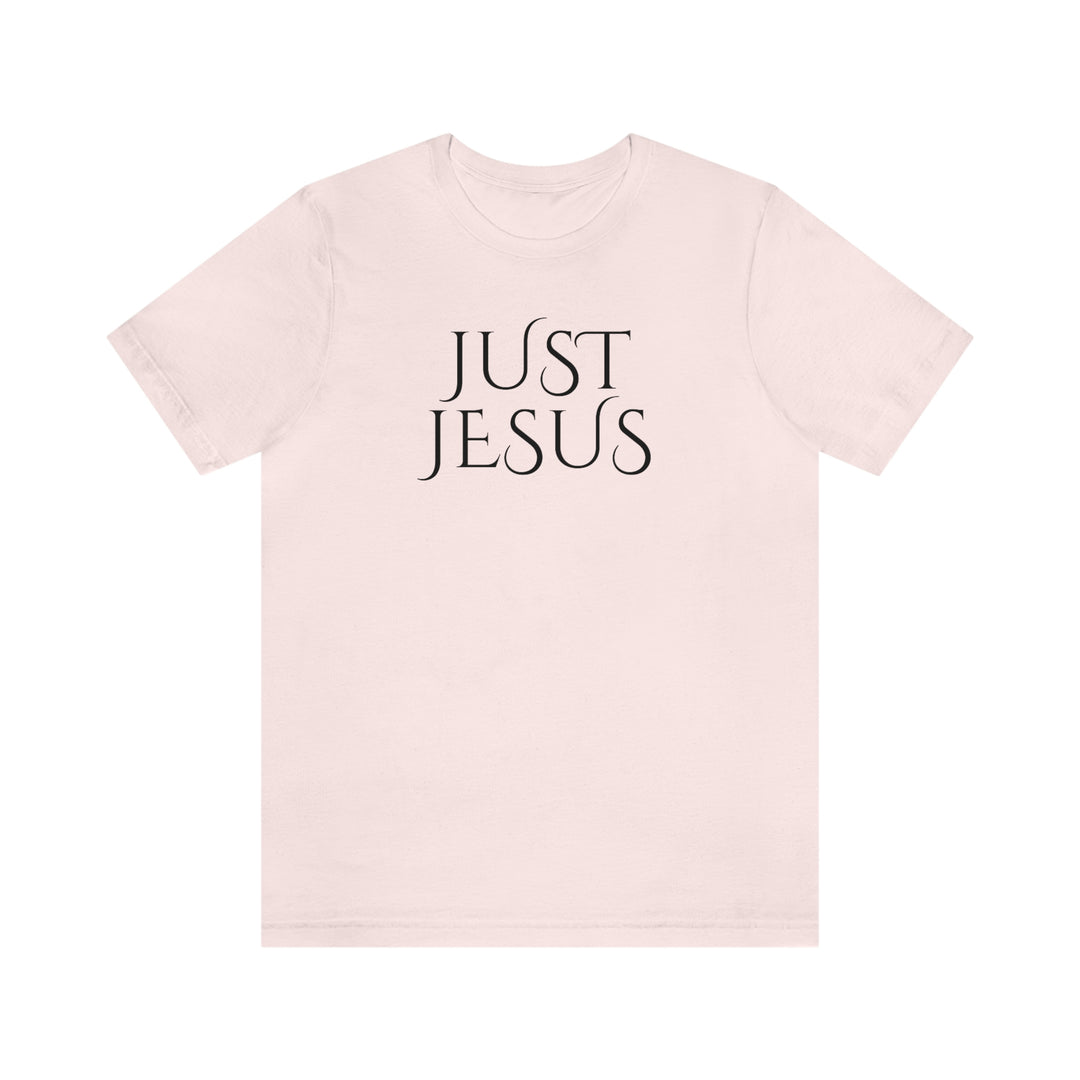 A beloved Just Jesus Tee in white with black text, featuring ribbed knit collars and taping on shoulders for lasting fit. Made of 100% Airlume combed cotton, with a retail fit.
