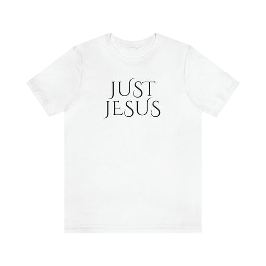A classic Just Jesus Tee in white, featuring black text. Unisex jersey tee with ribbed knit collar, taping on shoulders, and dual side seams for shape retention. Made of 100% Airlume combed cotton.
