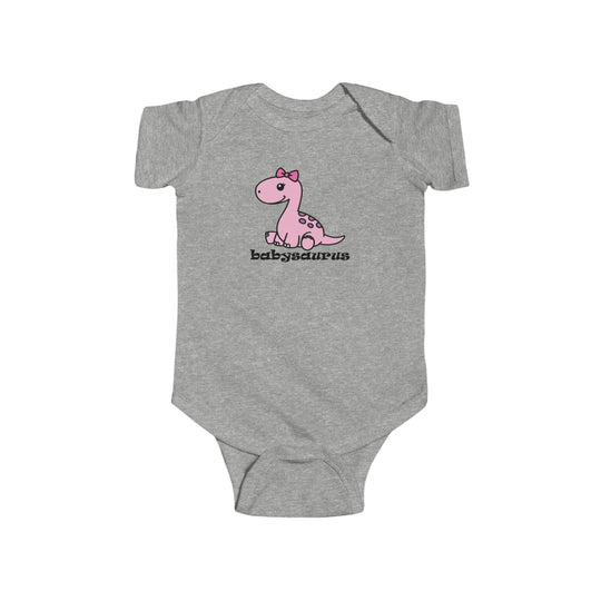 A grey baby bodysuit featuring a pink dinosaur cartoon, ideal for infants. Made of soft, durable 100% cotton fabric with ribbed knit bindings and plastic snap closures for easy changing. From 'Worlds Worst Tees'.